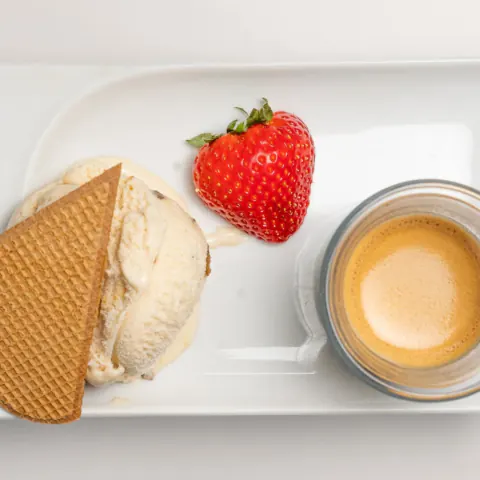 Ice cream served with espresso and a wafer