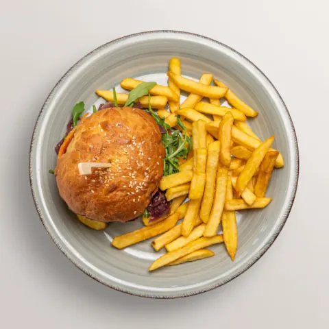 Vegetarian burger with French fries