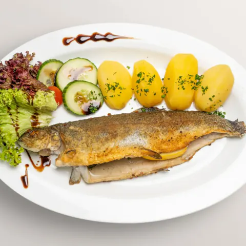 Fried trout with boiled potatoes